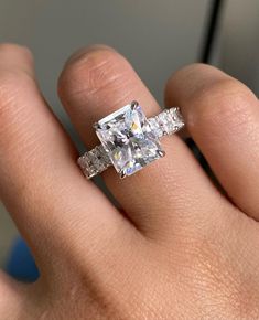 Radiant Cut Moissanite Engagement Ring , 6CTW Anniversary Ring, 14K White Gold Wedding Ring, Hidden Halo Ring, Luxurious Ring, Gift For Her ♣ Stone Details ☛ Stone Size:  3CT (9.5MM x 7.8MM) Radian Cut Moissanite  ☛ Side Stone: 2.10CTW Emerald Cut  Moissanite / 0.90CTW Round Cut Moissanite ☛ Band Width: 3.20MM ☛ Stone Color (White) ☛ Clarity - VVS1 ☛ Luster: Excellent ☛ Make: High Quality ☛ Center Shape: radiant Cut ☛ Metal Change(10k/14k/18k White/Yellow/Rose Gold) ☛ Handmade item ★ Moissanite Guarantee :   Test By Diamond Tester Its Test Show Positive 100% I accept custom-making orders. please contact me if you need this service. All the jewelry in my store is handmade .it may take 2-3 weeks to finish. ♣ Buy with Warranty: ☛ 14 Days Money Back Guarantee; ☛Excellent Customer Service; ☛  F Wedding Ring Hidden Halo, Radiant Cut Moissanite Ring, Radiant Cut Moissanite Engagement Ring, Radiant Engagement, Radiant Cut Rings, Hidden Halo Ring, Ring Hidden Halo, White Gold Wedding Ring, Vintage Jewelry Art