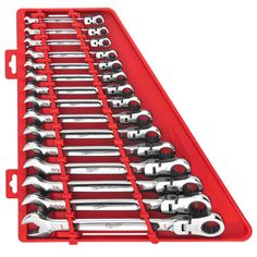 a red tool tray filled with lots of wrenches and spanner's bits