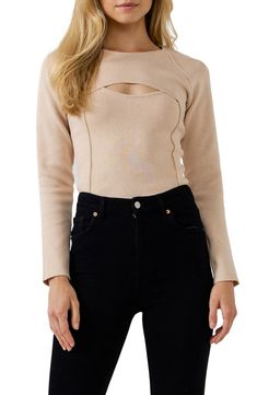 A removable bolero brings three-in-one styling options to this two-piece sweater set featuring exposed seams and a midweight feel. Set includes one knit top and one bolero 18 3/4" length Jewel neck Long sleeves 70% viscose, 30% nylon Hand wash, dry flat Imported Elegant Fitted Cropped Sweater, Fitted Cream Sweater For Layering, Elegant Cropped Fitted Sweater, Fitted Cream Sweater, Fitted Cropped Knit Top For Fall, Fall Cropped Fitted Knit Top, Fall Cropped Knit Top, Chic Fitted Sweater For Night Out, Fitted Cream Knit Top For Winter