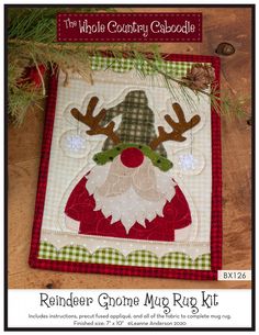 the reindeer gnome mug rug kit is ready to be sewned and stitched