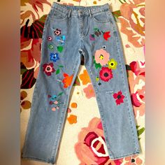 Adorable Floral Painted Jeans. 30” Inseam. Waist Measures 16” Across. New Without Tags. Multicolor Floral Print Jeans For Spring, Pink Floral Print Jeans For Summer, Blue Relaxed Fit Jeans With Floral Embroidery, Blue Jeans With Floral Embroidery, Relaxed Fit, Blue Floral Embroidery Relaxed Fit Jeans, Casual Multicolor Floral Embroidered Bottoms, Casual Multicolor Floral Embroidery Bottoms, Spring Cotton Jeans With Multicolor Embroidery, Spring Embroidered Multicolor Bottoms