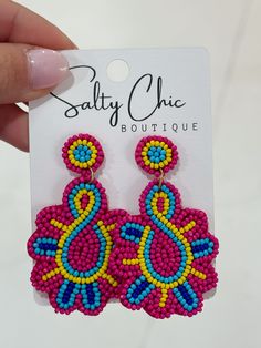 Add a pop of color to your outfit with these seed bead flower earrings from Simply Noelle! Available in 4 vibrant colors, these playful earrings are the perfect way to express yourself and elevate your style. Say goodbye to boring accessories and hello to fun and unique fashion! (Earrings may cause excessive compliments. Use at your own risk!) Beaded Multicolor Flower Earrings For Summer, Multicolor Beaded Flower Earrings For Summer, Multicolor Beaded Flower Earrings For Spring, Multicolor Flower Earrings With Colorful Beads, Summer Multicolor Beaded Flower Earrings, Spring Multicolor Beaded Flower Earrings, Trendy Multicolor Beaded Earrings For Summer, Summer Party Flower Earrings With Colorful Beads, Summer Beaded Earrings With Tiny Beads