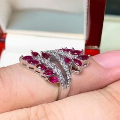 What you see in the pictures, is what you will get! No duplicates or twins! One of a kind EXTREMELY ELEGANT CERTIFIED NO-GLASS-FILLING, GENTLE HEAT ONLY, CLUSTER STYLE, VIVID RED RUBY RING. Extremely rare signature VIVID RED, EXTREMELY BEAUTIFUL! VS CLARITY quality RUBY. With numerous brilliant round F/VS diamonds. Set in a handmade, ONE OF A KIND, 18K solid white gold ring!! ONE OF A KIND! WHAT YOU SEE IN THE PICTURES IS THE EXACT RING YOU WILL GET NO DUPLICATES!! SUGGESTED RETAIL PRICE: $3,500 Gia Certified Marquise Platinum Rings, Gia Certified Marquise White Gold Diamond Ring, Gia Certified Platinum Marquise Rings, Gia Certified Marquise White Gold Ring, Gia Certified Marquise Diamond Ring For Anniversary, Formal White Gold Ruby Ring With Marquise Cut, Gia Certified Marquise Diamond Ring For Wedding, Gia Certified Marquise Diamond Wedding Ring, Gia Certified White Gold Marquise Cut Ring