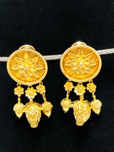 Vintage a striking pair of disc and fringe earrings by LaLaounis from the classical and Hellenistic collection ,Circa 1960's the earrings designed as a highly ornates a highly ornate disc decorated with extensive twisted wirework in floral ,star and spiral motifs with three articulated fringe drops all suspending a floral motif and the with a bull's head to the central drop and an acorn to each side ,with post and clip fittings. Maker: ILIAS LALAOUNIS/ Period: Circa 1960 / Origin: Greece./ 18k y Traditional Evening Clip-on Earrings, Traditional Clip-on Earrings For Evening, Mens Sterling Silver Necklace, Tiffany Necklace, Sterling Silver Heart Necklace, Gold Clips, Silver Heart Necklace, Fringe Earrings, Clip Earrings