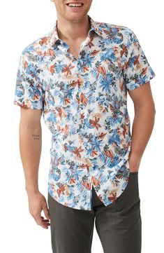 Let your sun-soaked adventure begin in this all-cotton sport shirt covered with tropical blooms and foliage. 31 1/2" length; 37" chest (size Medium) Front button closure Spread collar Short sleeves 100% cotton Dry clean or machine wash, line dry Imported Spring Beach Short Sleeve Shirt With Floral Print, Short Sleeve Floral Shirt For Spring Beach, Floral Print Short Sleeve Beach Shirt For Spring, Fitted Floral Print Shirt For Vacation, Fitted Button-up Hawaiian Shirt For Vacation, Spring Cotton Hawaiian Shirt With Hibiscus Print, Spring Hawaiian Shirt With Hibiscus Print In Cotton, Beach Season Floral Print Button-up Hawaiian Shirt, Summer Hibiscus Print Button-up Top