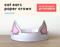 a cat ears paper crown is shown on a table with the words printable below it