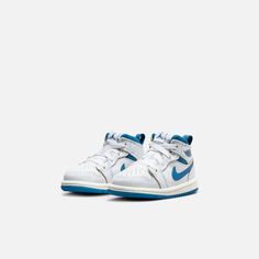 Style No. FN7537-141 Color: White/Sail/Industrial Blue This mini version of the classic Jordan 1 Mid combines an iconic design with fresh new colors. It's soft and flexible underfoot, easy to put on and comfortable for little feet. Jordan 1 Mid SE Baby/Toddler Shoes. Blue Classic High-top Sneakers For Sports, Classic Blue High-top Sneakers For Sports, Blue Scratch-resistant Sneakers For Streetwear, Blue Scratch-resistant Low-top Sneakers, Classic Blue High-top Sneakers With Round Toe, Casual White Scratch-resistant High-top Sneakers, Casual White Scratch-resistant Sneakers, Industrial Blue, Kids Jordans