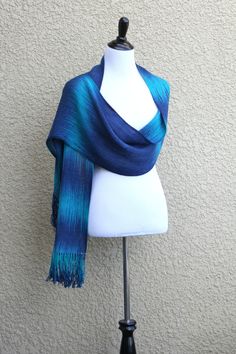 Hand woven scarf in dark blue and turquoise colors. Perfect #gift for her! This woven scarf is very soft and drapes nicely!  Measures: L: 78" with 6" fringe on both ends W: ... #kgthreads #accessories #cozy #fall #fashion #gradient #unisex #women #wrap Blue Bohemian Handwoven Shawl, Blue Shawl Wrap, Blue Handmade Bohemian Scarves, Blue Bohemian Handmade Scarves, Elegant Handmade Blue Scarves, Blue Bohemian Shawl With Fringe, Blue Bohemian Shawl Wrap, Ombre Scarf, Bridesmaid Shawl