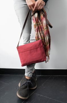 "The Marabara Day bag has been designed to accompany you every day. It is made of cotton canvas in a nice burgundy colour. Don't be tricked by its small size, this bag is roomy enough to carry all your daily essentials (wallet, phone, notebook, sunglasses...) and it's light as a feather. You won't even notice you are carrying it, so comfortable that you will want to take it with you all the time. It closes with a metal zipper and comes with an adjustable leather strap, in chocolate colour. It is Casual Burgundy Bags For Daily Use, Everyday Red Satchel With Zipper Pocket, Burgundy Crossbody Bag With Leather Handles, Casual Burgundy Satchel For Travel, Casual Burgundy Rectangular Satchel, Casual Burgundy Rectangular Shoulder Bag, Cotton Satchel With Canvas Lining, Everyday Cotton Satchel With Canvas Lining, Burgundy Rectangular Satchel For Everyday