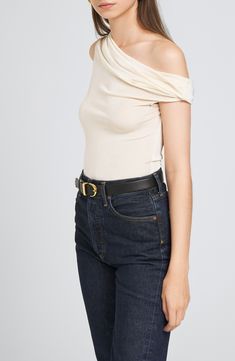 Designed in a sweet shoulder-baring silhouette, this stretchy and versatile jersey bodysuit is the perfect piece to start off your next OOTD. Snap closure One-shoulder neck Short sleeves 95% polyester, 5% elastane Hand wash, dry flat Imported Off-shoulder Bodysuit For Night Out, Chic Stretch Off-shoulder Bodysuit, Chanel Loafers, Fabric Gift Bags, Nordstrom Store, Fabric Gifts, Free Fabric, Snap Closure, To Start