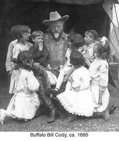 an old black and white photo of three children