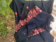 Soft Black Scarf with Floral Embroidery, Womens Wrap  🎓 Item Description & Materials 🎓 Very soft black long scarf with machine embroidered flowers  in bright colors  and 2 inches fingers for women. The scarf is not used and in very good condition 📏 Sizing 📏 Dimensions: 74 x 27 inches ( 2 inches fingers ) 188 x 68 cm ( 5 cm fingers ) All of the pictures are genuine and taken by me. You get the exact item in the pictures. If you have any questions or want additional pictures, please do not hesitate to ask. 🔎 Related Pieces🔎 For more vintage finding follow this link: https://www.etsy.com/shop/ClioVintageFinds?ref=shop_sugg_market Thank you for visiting my shop and supporting my little business ! Traditional Floral Embroidered Scarf For Spring, Traditional Floral Embroidered Scarves For Spring, Embroidered Black Shawl Dupatta, Embroidered Black Dupatta Shawl, Folk Style Black Shawl For Winter, Traditional Black Shawl With Floral Embroidery, Embroidered Black Pashmina Shawl, Traditional Black Pashmina Shawl For Winter, Black Embroidered Dupatta For Festivals