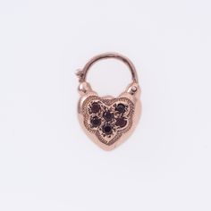 Gold Heart Padlock with Garnet stones set in 14K Rose Gold Details and Measurements: ► 14 Karat Rose Gold ► Length 21mm / 13mm / 14mm width ► 6 Garnet 2 mm ► Total Weight 4.1 gr All items are Handmade, I pay a lot of attention for every detail in the jewelry I design. All of my items are hand crafted in Kisufim's Designer jewelry Store in Tel Aviv, and shipped direct to customers all over the world.  I am proud to say that many celebrities, models and stars across the world wear my jewelry. ►► F Vintage Padlock, Grey Diamond Ring, Heart Padlocks, Heart Gemstone, Garnet Stone, I Design, Gold Heart, Lady Dior Bag, Heart Of Gold