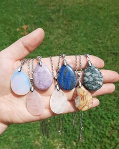 🌿Welcome and greetings friend🌿  For our latest treasure finds and new crystal arrivals, follow us @abundantsoulcrystals on Instagram  🌿 This listing is for ONE crystal drop necklace similar to photo. Each piece has color variation but all are lovely. Available in rose quartz, opalite, clear quartz, lapis lazuli, moss agate, crazy lace agate and lepidolite. Please use drop-down menu to make desired selection.  🌿 Measurements are approximate:  22 inch silver plated chain 2 inch pendant Please remove when swimming or bathing Super Cute! 🌿 Kindly double check the address you have listed for delivery as that is the one I use for shipping. If your address has changed please send me a message with your order and I will update. I can not ship a replacement item or issue refunds for incorrect Teardrop Natural Stones Necklace For Gift, Spiritual Gemstone Teardrop Pendant Crystal Necklaces, Spiritual Teardrop Gemstone Crystal Necklace, Adjustable Drop Necklace With Natural Stones As Gift, Healing Natural Stone Teardrop Pendant Necklace, Adjustable Drop Necklace With Natural Stones For Gift, Teardrop Agate Jewelry For Healing, Teardrop Gemstone Necklaces For Healing, Spiritual Teardrop Pendant Crystal Necklaces With Natural Stones