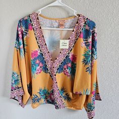 Flying Tomato Woman Nwt Size L Cross Over Top Kimono Sleeves Elastic Hem Floral, Tropical Bohemian Measurements While Laying Flat Length 21 Bohemian V-neck Tops With Tropical Print, Bohemian Blouse With Tropical Print For Beach, Spring Tropical Patterned Tops, Bohemian Multicolor Tropical Print Tops, Bohemian Long Sleeve Top With Tropical Print, Boho Print Summer Tops For Brunch, Boho Print Tops For Summer Brunch, Summer Boho Print Tops For Brunch, Bohemian Long Sleeve Tropical Print Top