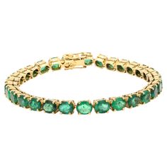 Green Emerald Tennis Bracelet in 14K Gold. It has a perfect oval cut gemstone to make you stand out on any occasion or an event. A tennis bracelet is an essential piece of jewelry when it comes to your wedding day. The sleek and elegant style complements the attire beautifully, whether it's the bride wearing it herself, or as a gift to her bridesmaids to wear on the D’day. A gold gemstone bracelet is the ultimate statement piece for every stylish woman. PRODUCT DETAILS :- Material - 14K Solid Ye Luxury Green Bracelet With Polished Finish, Emerald Tennis Bracelet, Bracelet Tennis, Modern Bracelets, Yellow Gold Setting, Emerald Stone, Emerald Gemstone, Green Emerald, D Day