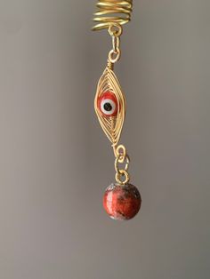 Evil eye Loc/Braid charm. Made with tarnish resistant gold plated wire and glass beads. Each order comes with 1 bead in your choice of color: red,yellow, or blue. Hair Charm, Dread Accessories, Jewelry Evil Eye, Hair Charms, Loc Jewelry, Boho Hair, Beaded Cuff, Hair Beads, Boho Hairstyles