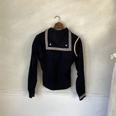 "Hello and welcome to the Textile Trunk! Please follow us on Instagram, we are @textiletrunk An absolutely amazing find, I think this is an authentic French or English naval sailor's shirt! It is made of felted wool, and zips up the side (see condition details). There is a stamped label on the inside that says \"W.R. Touzeli / 248-06-25\", which might be in reference to the soldier who owned it! It seems like there may have been a tag sewn into the back at the nape of the neck that has since bee Fitted Cotton Tops With Sailor Collar, Cotton Sailor Top With Sailor Collar, Fitted Navy Vintage Tops, Fitted Vintage Navy Tops, Vintage Navy Long Sleeve Tops, Cotton Sailor Collar Top For Work, Cotton Uniform Tops With Collar, Collared Cotton Tops With Uniform Style, Cotton Uniform Shirt With Long Sleeves