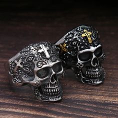 Vintage Men Skull Cross Ring This punk-inspired ring is a striking accessory for those who embrace a bold style. Made from durable stainless steel, this ring is built to last, ensuring that its unique design will remain vibrant without fading. Specifications - **Metals Type:** Stainless Steel - **Gender:** Unisex - **Material:** Metal - **Style:** Classic - **Rings Type:** Cocktail Ring - **Surface Width:** 20mm - **Function:** Skull Ring Sizes Available Choose from a variety of sizes to find yo Black Stainless Steel Rings For Halloween, Halloween Black Stainless Steel Ring, Gothic Metal Ring For Streetwear, Gothic Metal Rings For Streetwear, Black Ring For Halloween Streetwear, Black Metal Skull Ring For Streetwear, Punk Skull Ring For Streetwear, Black Biker Skull Ring Gift, Punk Style Skull Shaped Metal Rings