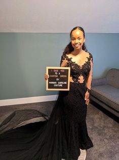 Bride posing in her custom black wedding gown