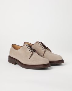 Suede Derbys Refined Brunello Cucinelli materials enrich the casual style of the Derby, a timeless style of masculine elegance. The suede enhances the season’s colors with its soft, slightly irregular texture. The footwear’s versatile feel is completed by the sporty attitude of the lightweight rubber lug outsole. Casual Suede Oxfords For Derby, Derby Suede Brogue Oxfords, Suede Lace-up Oxfords For Derby, Luxury Suede Lace-up Shoes For Derby, Suede Brogue Derby Lace-up Shoes, Masculine Elegance, Blazer And T Shirt, Mens Eyewear, Eyewear Womens