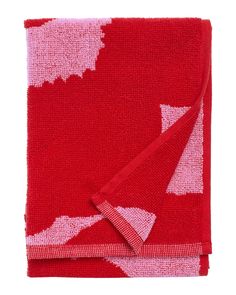 a red and white towel folded on top of each other