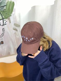 An adult-sized version of our baseball cap with Milk Teeth logo embroidery. In soft cotton canvas with an adjustable brass fastening in back. Cotton Visor Baseball Cap With Letter Embroidery, Cotton Baseball Cap With Letter Embroidery, Casual Snapback Hat With Letter Embroidery For Streetwear, Casual Streetwear Snapback Hat With Letter Embroidery, Cotton Dad Hat Baseball Cap For College, Cotton Trucker Hat For College, Casual College Baseball Cap With Curved Visor, Casual Brown Snapback Hat With Letter Print, Casual Brown Baseball Cap With Letter Print