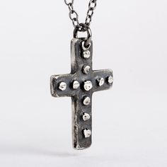 This cross is handmade of solid 925 sterling silver (92.5% pure silver) in my studio. I used a dark patina to bring out the details of the cross and give it the worn out look of time. Cross Height: 1 1/2 inch (3.5 cm) Width: 3/4 inch (2 cm) Necklace chain: choose your length Gothic Cross Necklace With Oxidized Finish, Gothic Oxidized Cross Necklace, Sterling Silver Oxidized Crucifix Necklace, Oxidized Cross Pendant Necklace, Oxidized Sterling Silver Cross Pendant Necklace, Medieval Cross Pendant Necklace Gift, Medieval Cross Necklace As Gift, Medieval Cross Necklace For Gift, Medieval Cross Necklaces As Gifts