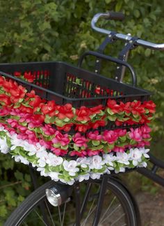 a bicycle with flowers in the basket