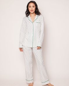 Game, set, sleep! Serve up a winning combination of comfort and style with our tennis print pajamas. Featuring a pair of classic crossed green racquets and a tennis ball, this design captures the undeniable charm of a classic sport. Whether you're a tennis enthusiast or simply appreciate it from the stands, these hand-drawn motifs celebrate the spirit of the game. This classic pajama set is accented with green piping and finished with pearl buttons. The fabric is made from 100% of the finest qua Classic White Relaxed Fit Sleepwear, Green Printed Sleepwear With Relaxed Fit, Casual Green Printed Sleepwear, Green Relaxed Fit Printed Sleepwear, Classic White Sleepwear For Pajama Party, White Sporty Sleepwear With Relaxed Fit, White Classic Sleepwear For Spring, Green Cotton Sleepwear For Overnight, Baby Gear Essentials