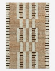 a brown and white rug with stripes on it