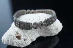 This is the perfect option for those who like cool, unique jewelry and the luxury, shine of sterling silver .This bracelet  is well made, cute and/or elegant in design, and very desirable.  The bracelet is decorated with gray and clear cz .The clasp is in good working condition. The clasp is with safety hook.This bracelet is hard to find. The Wachenheimer Brothers Company of Providence, Rhode Island, started business in 1907. The bracelet is marked on the back of the catch Sterling Diamonbar Pat Vintage Silver Diamond Bracelet With Single Cut Diamonds, Art Deco Silver Diamond Bracelets, Art Deco Silver Diamond Bracelet, Art Deco Diamond Bracelet In Silver, Art Deco Silver Bracelets With Single Cut Diamonds, Art Deco Silver Bracelet With Single Cut Diamonds, Silver Diamond Bracelet For Anniversary In Art Deco Style, Art Deco Silver Bracelets With Diamond Accents, Silver Engraved Diamond Bracelet For Anniversary