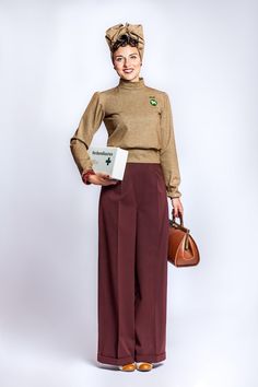 Beige coloured wide, high waisted pleat- front trouser with side button fancing on the left side and creases.The trouser has 4 cm turn ups. The fabric is a polyester/ wool mix.55% polyester 45% woolmachinewashing wool program 30s Outfits, 1930s Outfits, 40s Mode, Beach Pajamas, Green Jumper, Trouser Outfit, Lindy Hop, 1940s Style, Vintage Inspired Fashion