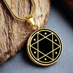 This Pentacle of Solomon Seal necklace Is the Perfect Gift for all those kabbalah lovers! Whether for Yourself or a Loved One.  Explore all our Solomon Seal jewelry here: https://www.etsy.com/in-en/shop/SymbolicPresent?ref=seller-platform-mcnav§ion_id=25122952 ➜ Our jewelry is made of high-quality surgical steel with a shatterproof liquid glass coating and an 18k gold finish option. ➜ Engrave onto the back of the Hexagram pendant your loved one's name, your wedding date, an anniversary, or anyth Symbolic Black Star Of David Jewelry, Black Star Of David Spiritual Necklace, Black Star Of David Necklace, Spiritual Style, Black Spiritual Necklace With Star Of David, Solomon Seal, Seal Jewelry, Seal Necklace, Seal Of Solomon, Solomons Seal