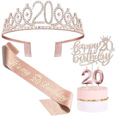 a birthday cake with a tiara on top and two candles in the shape of numbers