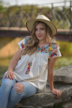 This Beautiful Hand embroidered blouse has a unique and Mexican inspired Floral design. The blouse is a fresh linen embroidered with cotton string by a Mexican Artisan. Note: Shoes and Jewelry modeled may be purchased here: Shoes: https://www.etsy.com/es/listing/828873953/zapato-artesanal-de-plataforma-zapato?ref=listings_manager_grid Filigrana Earrings: https://www.etsy.com/es/listing/637147293/filigrana-redonda-filigrana-clasica?ref=listings_manager_grid Traditional Spring Blouse With Machine Embroidery, Embroidered Linen Folk Tops, Folk Style Embroidered Linen Top, Folk Style Linen Top With Floral Embroidery, Summer Casual Peasant Top With Intricate Embroidery, Bohemian Tops With Machine Embroidery, Peasant Blouse With Floral Embroidery For Vacation, Spring Folk Style Tops With Machine Embroidery, Bohemian Blouse With Multicolor Embroidery For Summer