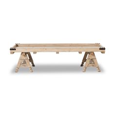 a wooden table with two legs and one leg raised up to the side, on a white background