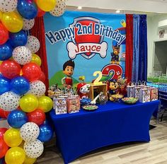 a birthday party with balloons and decorations