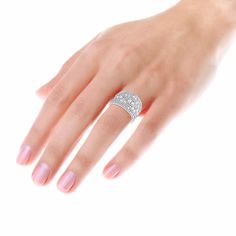 a woman's hand with a diamond ring on it