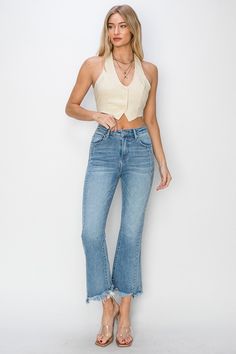 RISEN High Rise Step Hem Flare Jeans Medium wash stretch denim designed with a high rise, paneled detail, crop flare silhouette and finished with a step frayed hemline. The paneled detail adds a flattering and unique design making these jeans stand out. Medium wash High rise No distressing Cropped flare silhouette Frayed hem Step hemline Rise: 10.5" Inseam: 27" Fabric Content: 93% Cotton / 5% Polyester / 2% Spandex Fit: True to size Sizing: 1(25), 3(26), 5(27), 7(28), 9(29), 11(30), 13(31), 15(3 Jean Ideas, Boho Jeans, Baywatch, Denim Collection, Leg Design, Basic Style, Flare Jeans, Fit And Flare, Jumpsuit Dress