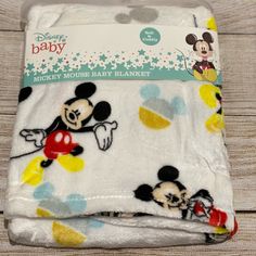 the mickey mouse baby blanket is on display