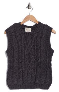 Sweater weather is calling this cozy vest knit with charming cables. 20 1/2" length (size Small) Crewneck Sleeveless 50% polyester, 45% acrylic, 5% wool Machine wash, tumble dry Imported Cable Knit Sweater Vest, Cozy Vest, Vest Knit, Clothing Industry, Knit Sweater Vest, Sweater Vests, Concert Looks, Baby Boy Shoes, Sweaters And Leggings