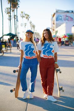 Our hometown - Venice, CA! Flowy skater design mixed and bright colors embodies Venice essence! The tee is the softest, most cozy shirt -- with a vintage wash, it looks like you grabbed it straight from your cool aunts 70s wardrobe. Our limited edition Junk Food Clothing Tee Shirt Collab is here! Now your favorite soft tees come in your favorite GRLSWIRL style. Casual Graphic Print Tops For Skateboarding, Trendy Graphic Print Tops For Skateboarding, Trendy Cotton T-shirt For Skateboarding, Casual White Top For Skateboarding, Groovy Summer Streetwear Tops, Casual Summer Tops For Skateboarding, Casual Tops For Summer Skateboarding, Casual T-shirt With Retro Print And Crew Neck, Casual Crew Neck T-shirt With Retro Print