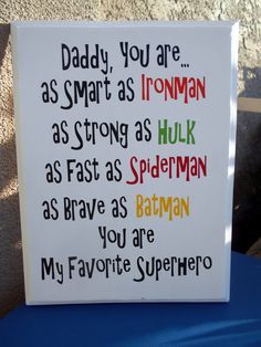 a sign that says daddy, you are as smart as ironman as strong as hulk as fast as superman as brave as batman