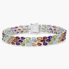 Show your true color with this multi-stone bracelet crafted in sterling silver featuring more than 90 oval gemstones in a flexible triple line design. Bracelet Crafts, Multi Stone, Gemstone Bracelets, Line Design, Stone Bracelet, Semi Precious Gemstones, Semi Precious, Jewelry Bracelets, Bracelet