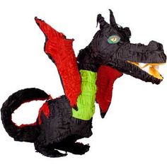 a small toy dragon with its mouth open