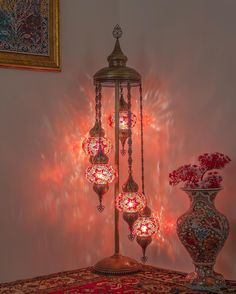 Style: Bohemian, Turkish Materials Used: Brass, Hand-blown glass, Colored Glass, Mirror Shards Color Variations: Red/Orange mosaic (main image) + 4 additional mosaic patterns Dimensions: Height: 51.2" / 130 cm Width: 10" / 26 cm Lightbulb Size: Compatible with E-12 (US) or E-14 (UK & EU) sockets. Lightbulbs not included. Voltage: Compatible with 110V and 220V. Durability: Brass is resistant to color changes and rust. Assembly Required: No Description: Elevate your living space with this exquisit Mirror Shards, Orange Mosaic, Bohemian Lamp, Turkish Lights, Turkish Mosaic Lamp, Turkish Mosaic, Corner Lamp, Ambience Lighting, Mosaic Floor