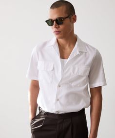 This 50s-inspired shirt is crafted from an exceptionally lightweight cotton poplin — breathable, cool, and not prone to wrinkling. It has a fine, silky feel that falls somewhere between our Summerweight and Oxford Shirts. Two patch-and-flap pockets at the chest give this short-sleeved shirt a more tailored look, which Sweatshorts Shorts, Polo Coat, Oxford Shirts, Todd Snyder, Linen Suits, Sneaker Dress Shoes, Casual Tank Tops, Oxford Shirt, Tie Shoes