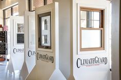 three different types of wine racks in a room with windows on each side and the words climate guard written on them