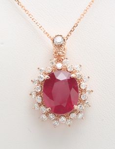 7.35 Carat Natural Red Ruby and Diamonds Women Chain and Pendant Made in 14K Solid Rose Gold Suggested Retail Value $5,999.00 Pendant Measurements are - 26.50 X 19.12 mm Ruby Measurements Approx are - 12.00 x 10.00 mm Total Ruby Weight is - 6.48 Carat Total Diamond Carat Weight is - .87 Carat Diamond Clarity: SI1-SI2 Diamond Color: H-I Chains available in - 16 INCH TOTAL ITEM WEIGHT IS 6.1 gram Disclaimer: All colors, measurements and weights are approximate and may vary slightly from the listed dimensions or as seen in the image'' Chain And Pendant, Women Chain, Rose Gold Pendant, Personalized Pendant, Diamond Carat, Red Ruby, Diamond Color, Natural Red, Diamond Clarity